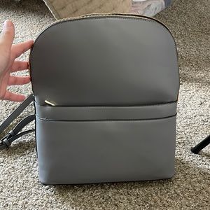 Grey leather backpack